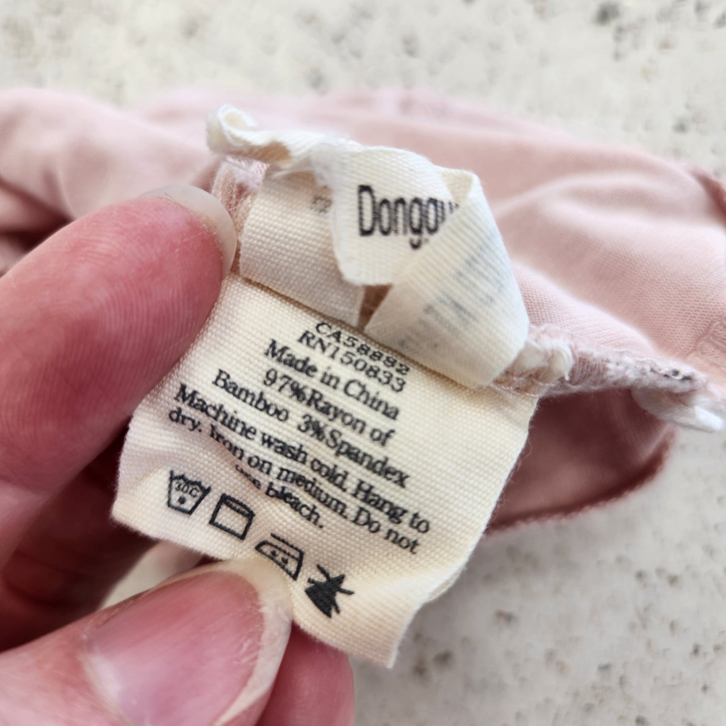 Size NB | Kyte Baby Pink Top Knot Hat | UBNUU