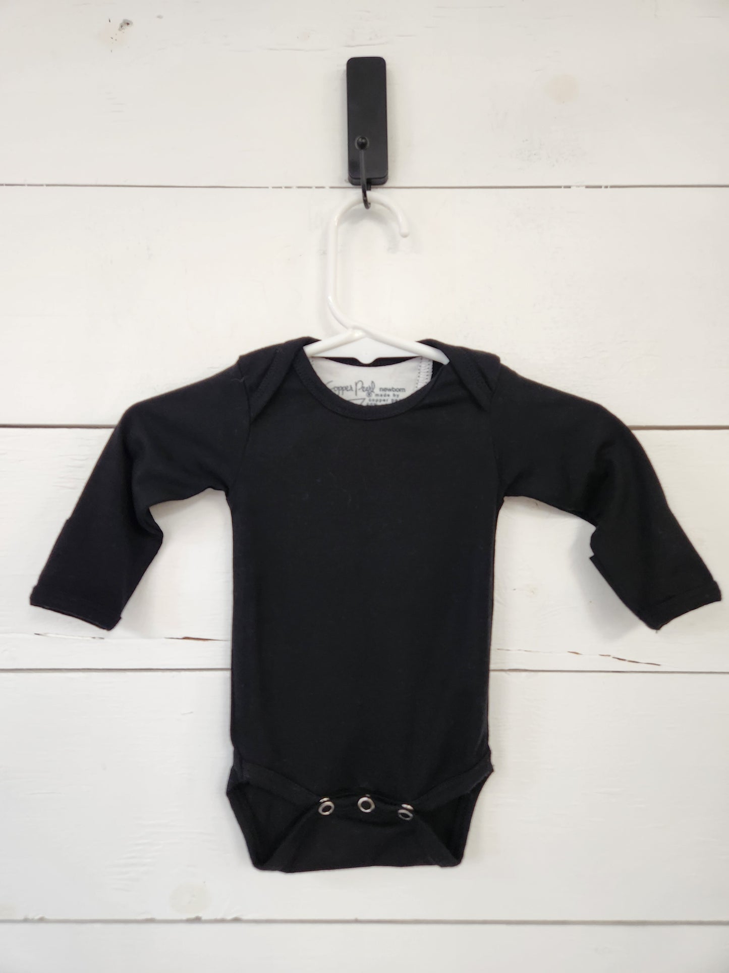 Size NB | Copper Pearl Black Longsleeve Bodysuit