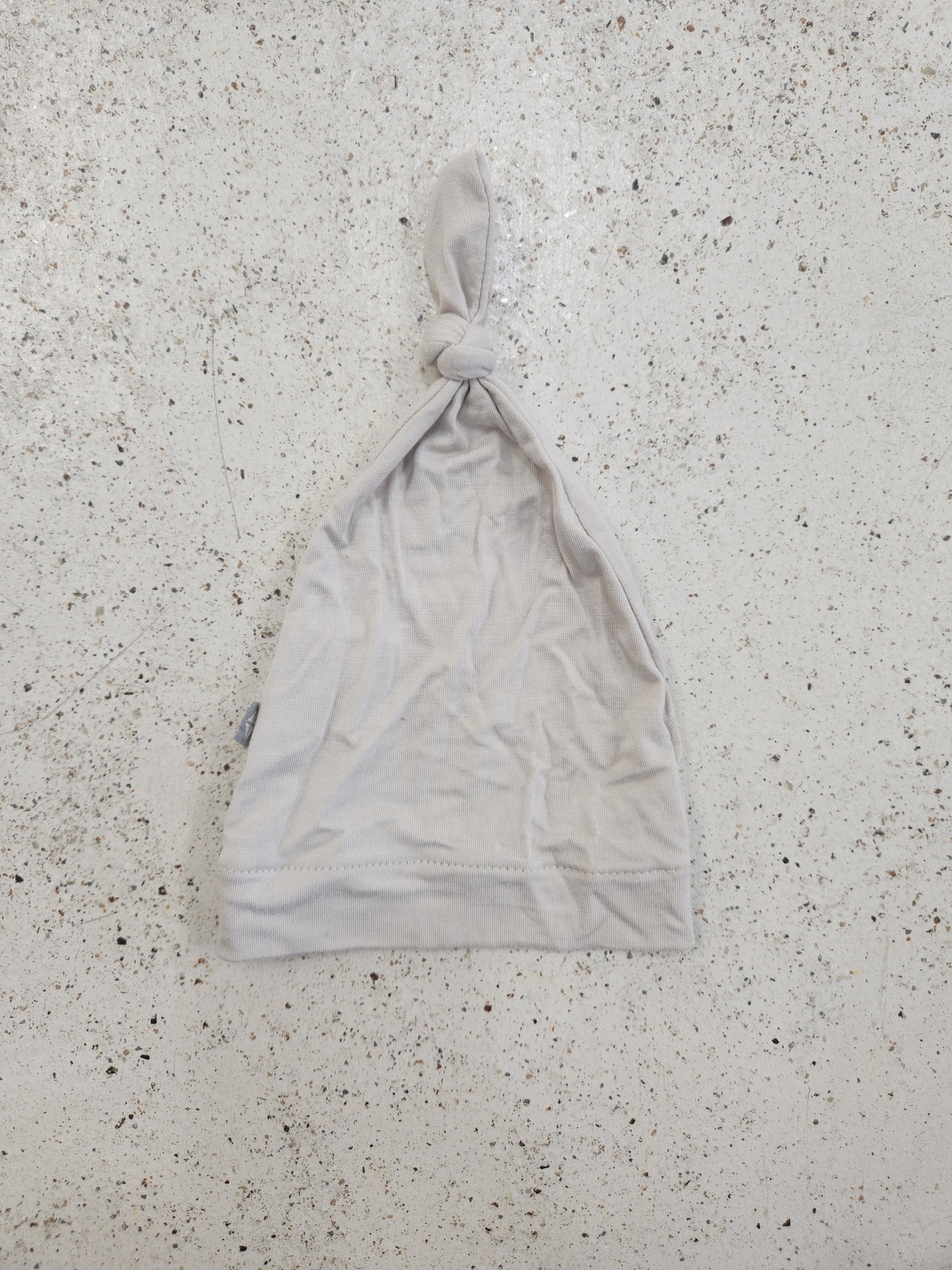 Size NB | Kyte Cream Top Knot Hat