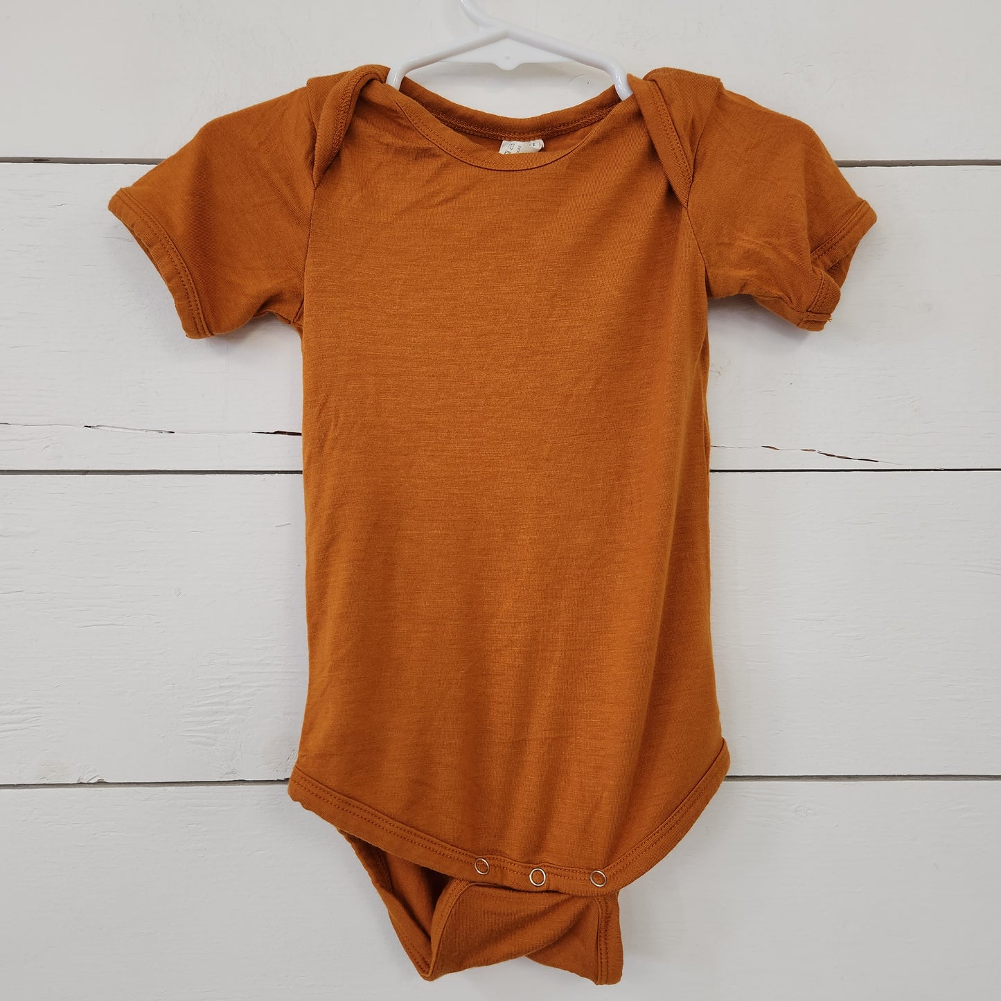 Size 12-18m | Kate Quinn Rust Bodysuit